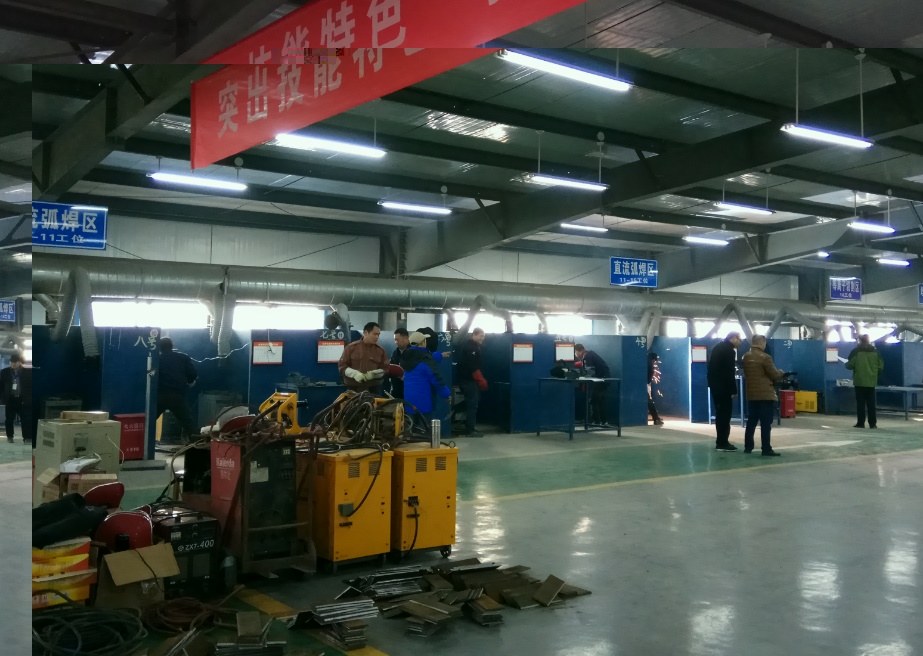 新郑市首届职业技能大赛焊工实操比赛在我校隆重举行(图1)